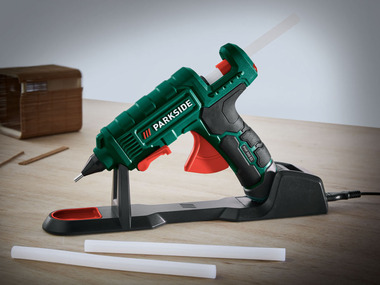 Hot gluing gun with 3 glue sticks